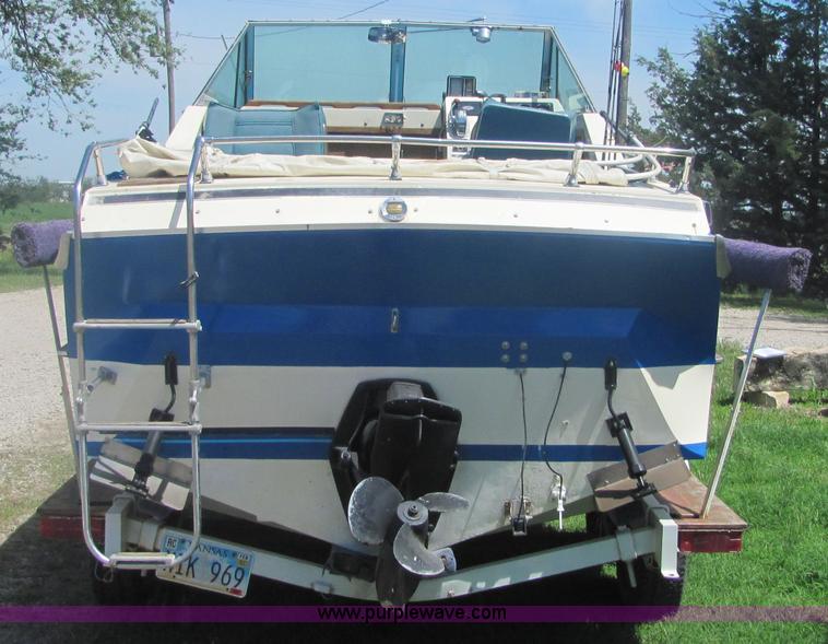 image for item 4616 1976 Glastron 25' cabin cruiser boat with trailer