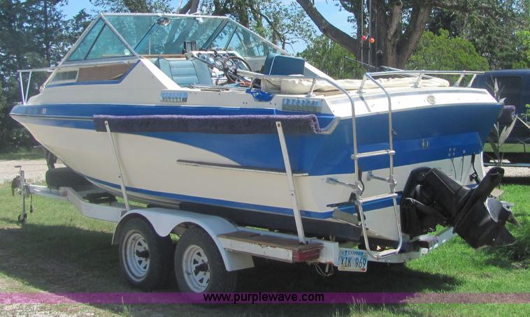 image for item 4616 1976 Glastron 25' cabin cruiser boat with trailer