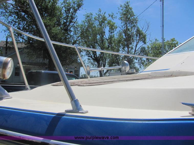 image for item 4616 1976 Glastron 25' cabin cruiser boat with trailer