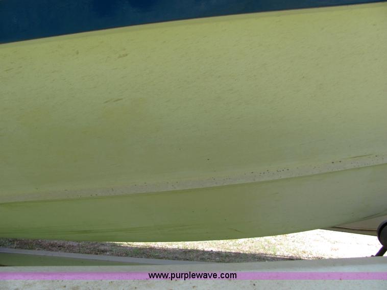 image for item 4616 1976 Glastron 25' cabin cruiser boat with trailer