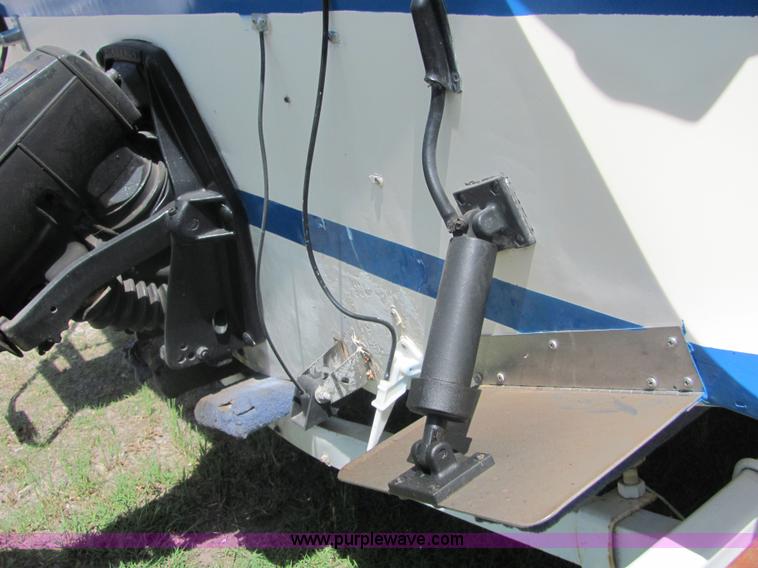 image for item 4616 1976 Glastron 25' cabin cruiser boat with trailer