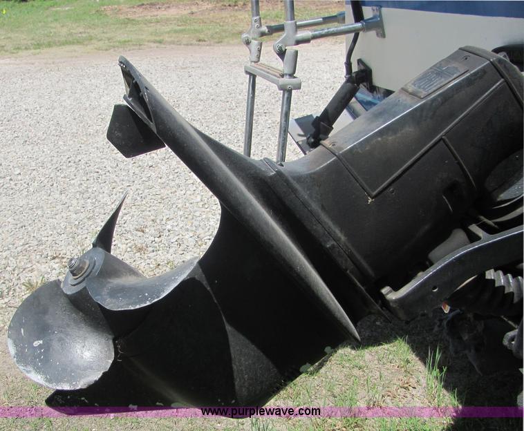 image for item 4616 1976 Glastron 25' cabin cruiser boat with trailer