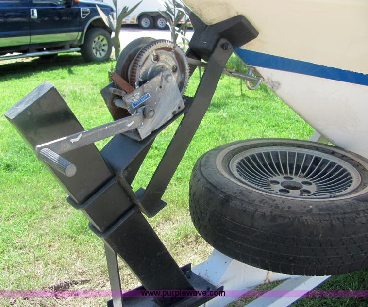 image for item 4616 1976 Glastron 25' cabin cruiser boat with trailer