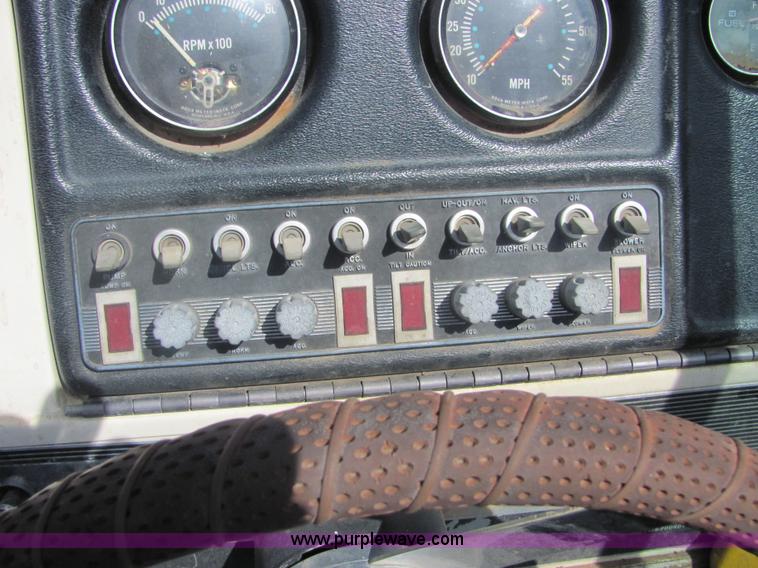 image for item 4616 1976 Glastron 25' cabin cruiser boat with trailer