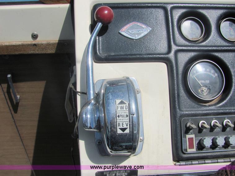 image for item 4616 1976 Glastron 25' cabin cruiser boat with trailer