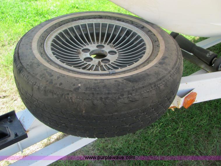 image for item 4616 1976 Glastron 25' cabin cruiser boat with trailer