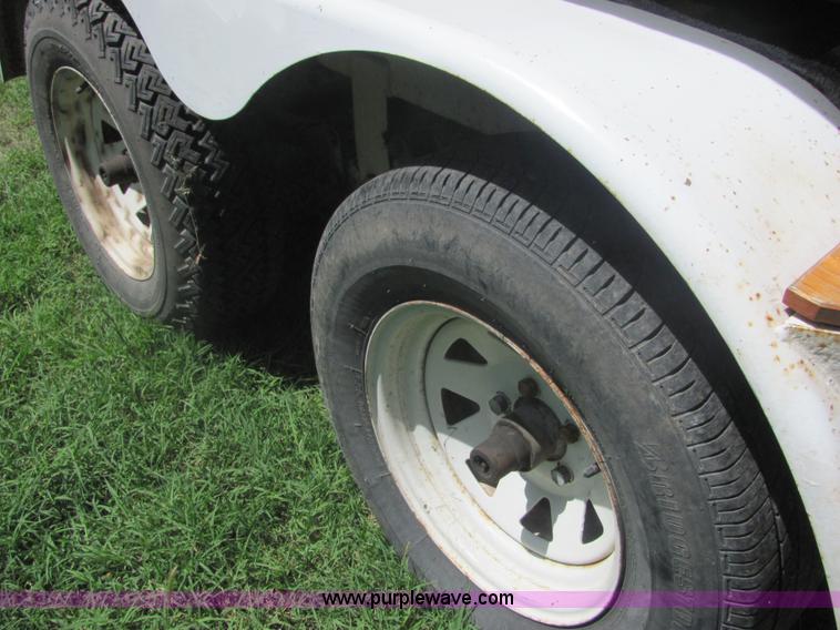 image for item 4616 1976 Glastron 25' cabin cruiser boat with trailer