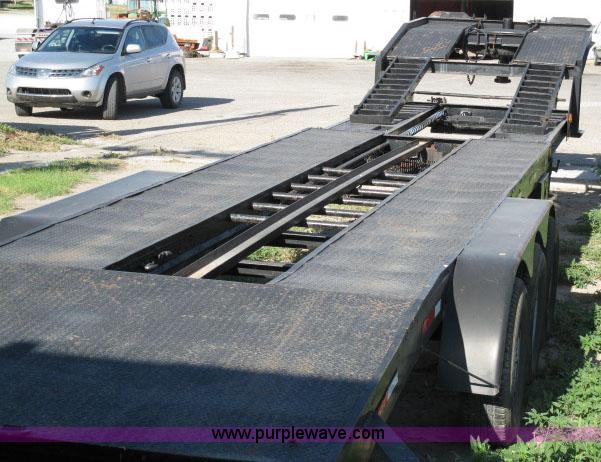 image for item 6235 1997 Hide-A-Bed triple axle gooseneck flatbed trailer