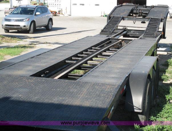 image for item 6235 1997 Hide-A-Bed triple axle gooseneck flatbed trailer