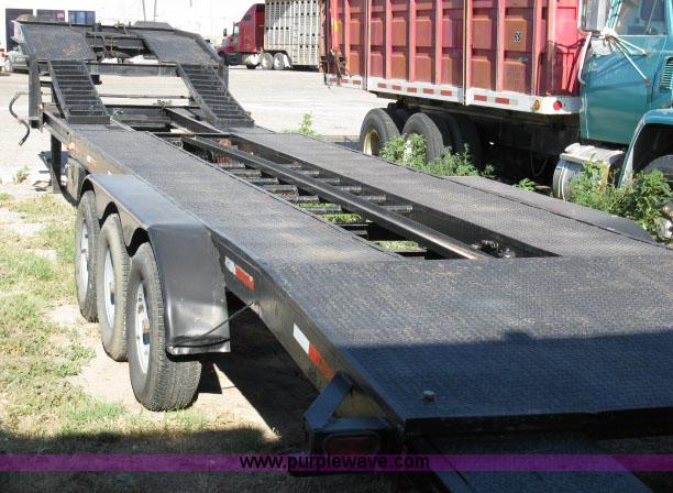 image for item 6235 1997 Hide-A-Bed triple axle gooseneck flatbed trailer