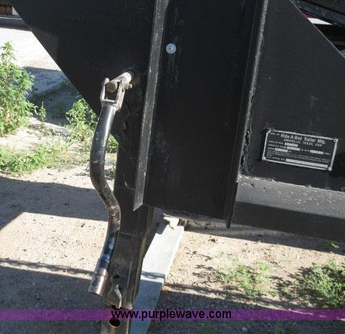image for item 6235 1997 Hide-A-Bed triple axle gooseneck flatbed trailer