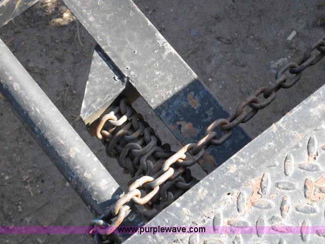 image for item 6235 1997 Hide-A-Bed triple axle gooseneck flatbed trailer