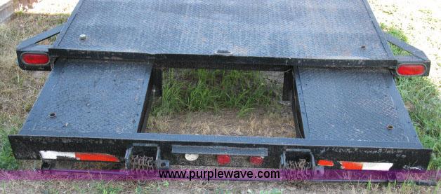 image for item 6235 1997 Hide-A-Bed triple axle gooseneck flatbed trailer