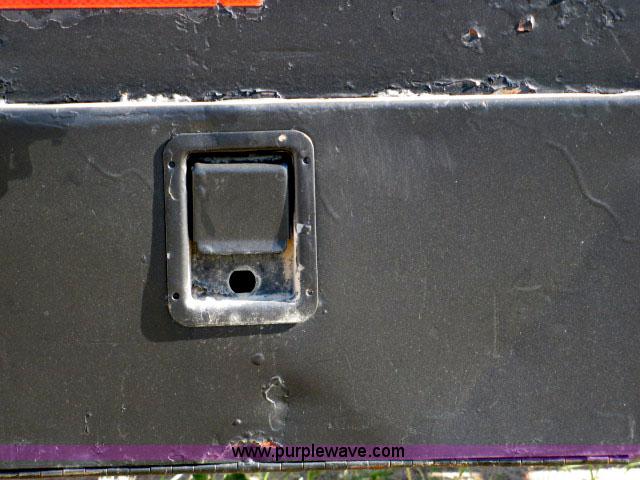 image for item 6235 1997 Hide-A-Bed triple axle gooseneck flatbed trailer