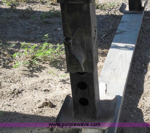 image for item 6235 1997 Hide-A-Bed triple axle gooseneck flatbed trailer