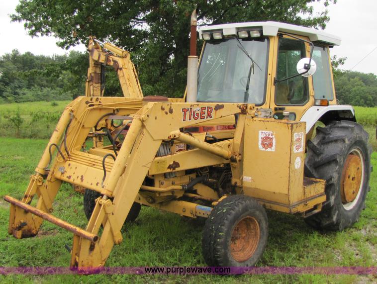 image for item 3054 1989 Ford 6610 Tiger Special tractor with 52" side boom mower