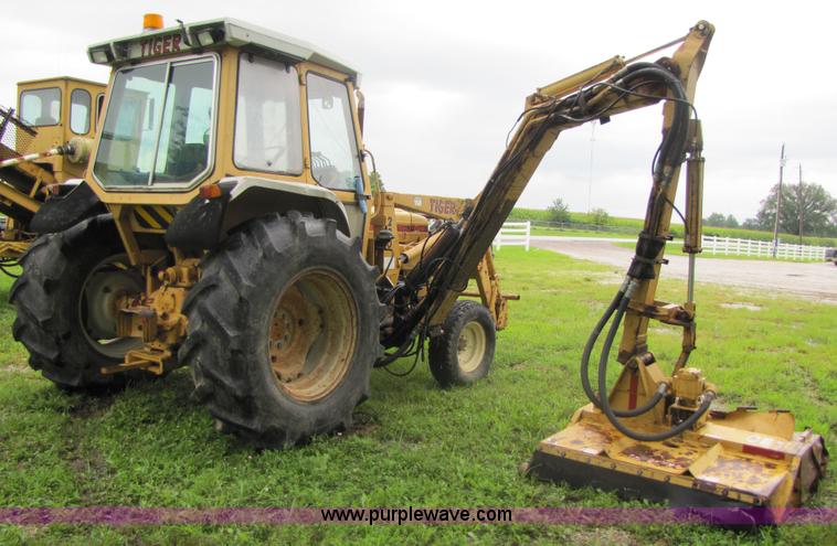 image for item 3054 1989 Ford 6610 Tiger Special tractor with 52" side boom mower