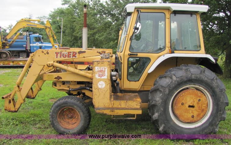 image for item 3054 1989 Ford 6610 Tiger Special tractor with 52" side boom mower