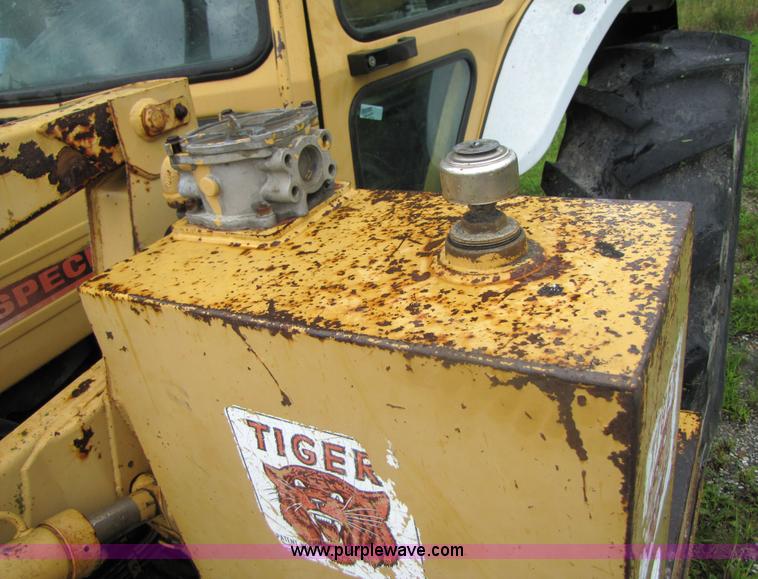 image for item 3054 1989 Ford 6610 Tiger Special tractor with 52" side boom mower