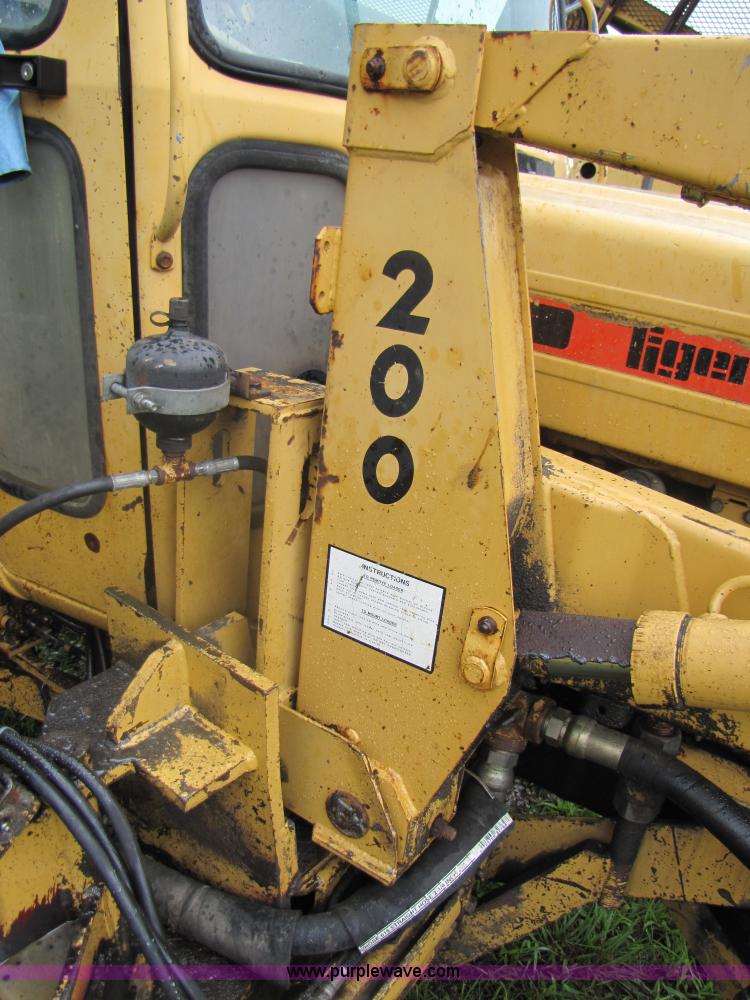 image for item 3054 1989 Ford 6610 Tiger Special tractor with 52" side boom mower