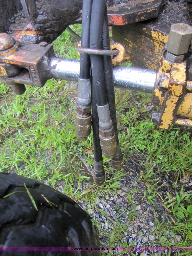 image for item 3054 1989 Ford 6610 Tiger Special tractor with 52" side boom mower