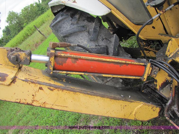 image for item 3054 1989 Ford 6610 Tiger Special tractor with 52" side boom mower