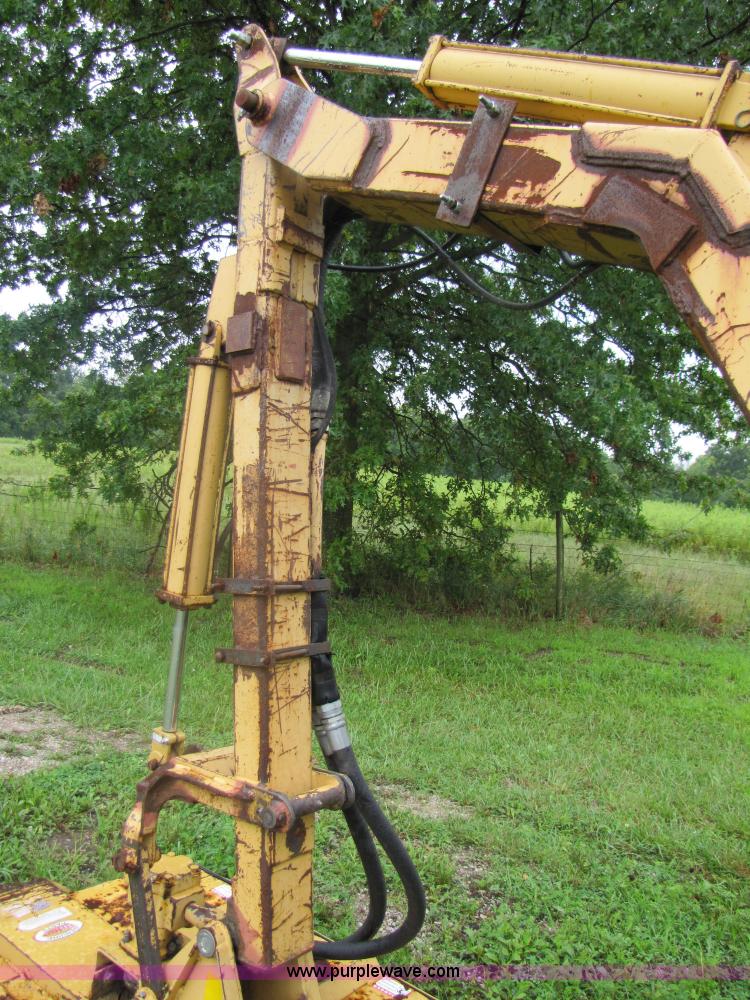 image for item 3054 1989 Ford 6610 Tiger Special tractor with 52" side boom mower