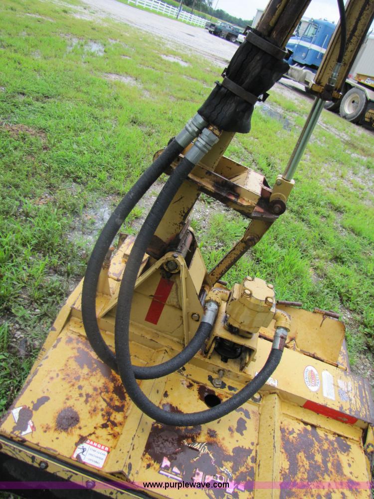 image for item 3054 1989 Ford 6610 Tiger Special tractor with 52" side boom mower