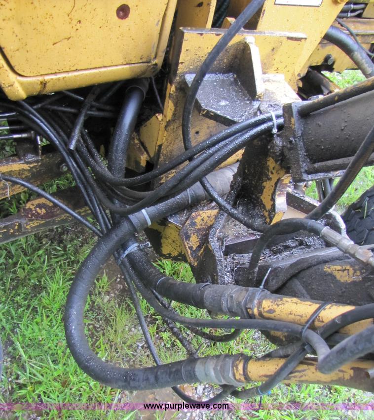 image for item 3054 1989 Ford 6610 Tiger Special tractor with 52" side boom mower