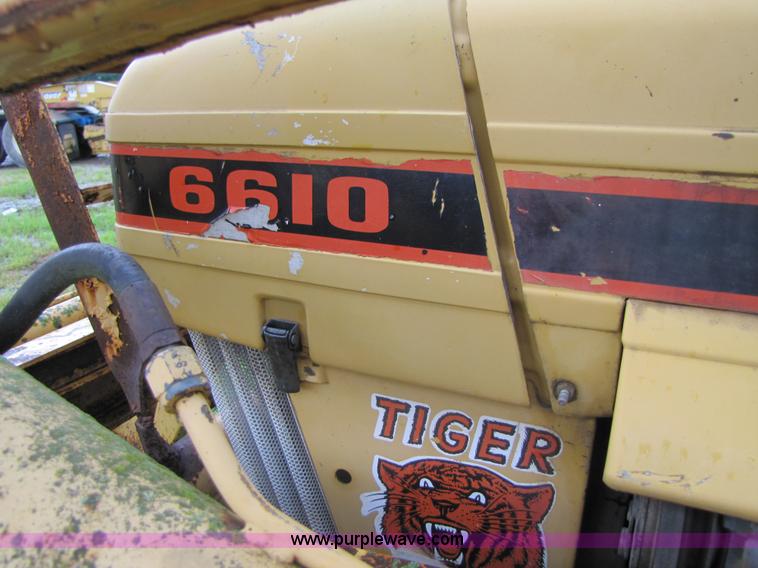 image for item 3054 1989 Ford 6610 Tiger Special tractor with 52" side boom mower