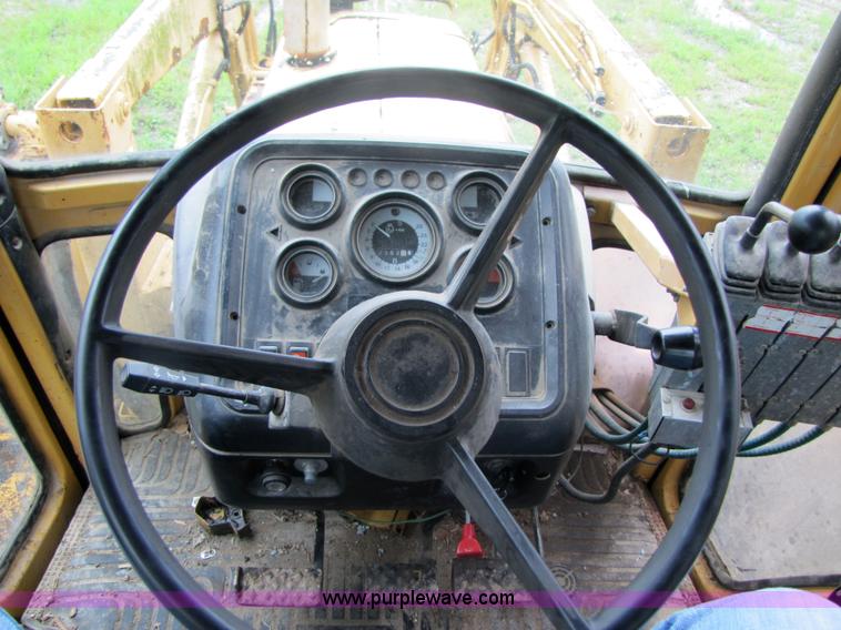 image for item 3054 1989 Ford 6610 Tiger Special tractor with 52" side boom mower