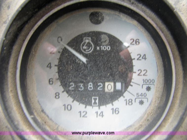 image for item 3054 1989 Ford 6610 Tiger Special tractor with 52" side boom mower