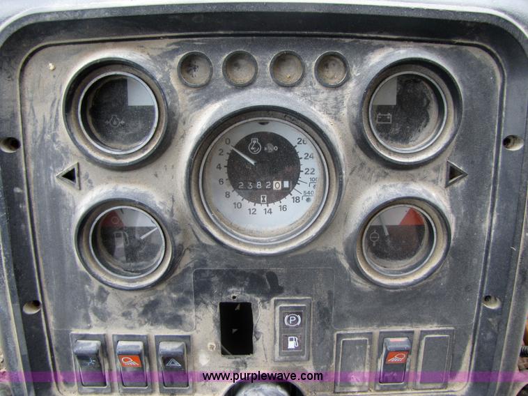 image for item 3054 1989 Ford 6610 Tiger Special tractor with 52" side boom mower