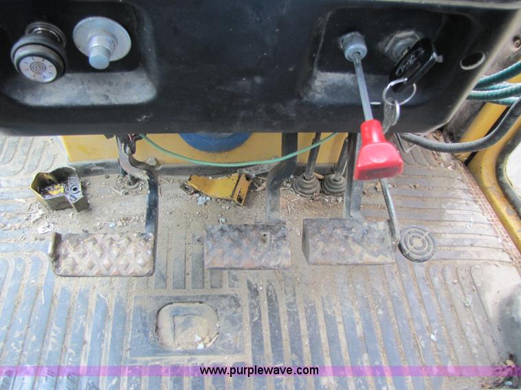 image for item 3054 1989 Ford 6610 Tiger Special tractor with 52" side boom mower