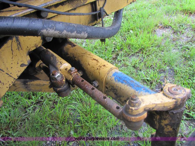 image for item 3054 1989 Ford 6610 Tiger Special tractor with 52" side boom mower