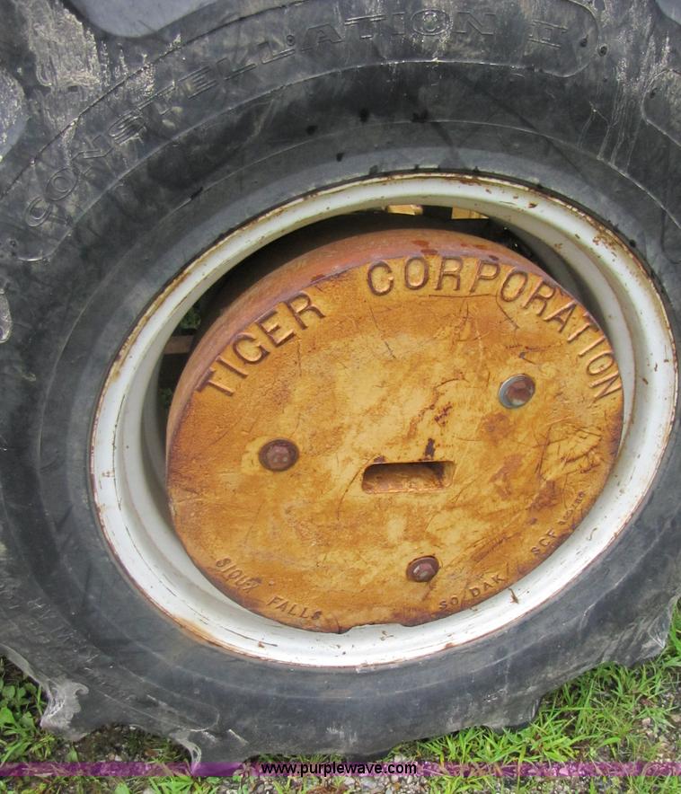 image for item 3054 1989 Ford 6610 Tiger Special tractor with 52" side boom mower