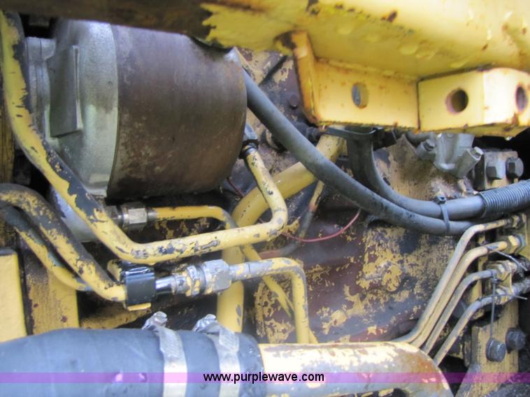 image for item 3054 1989 Ford 6610 Tiger Special tractor with 52" side boom mower