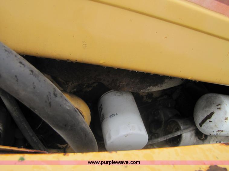 image for item 3054 1989 Ford 6610 Tiger Special tractor with 52" side boom mower