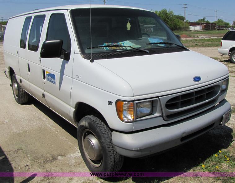 image for item 3136 1997 Ford utility van with shelving