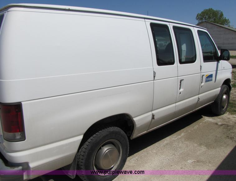 image for item 3136 1997 Ford utility van with shelving