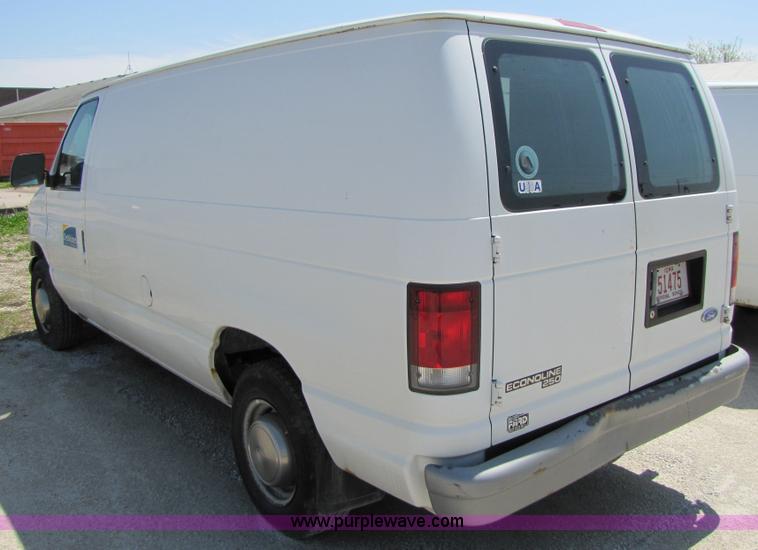 image for item 3136 1997 Ford utility van with shelving