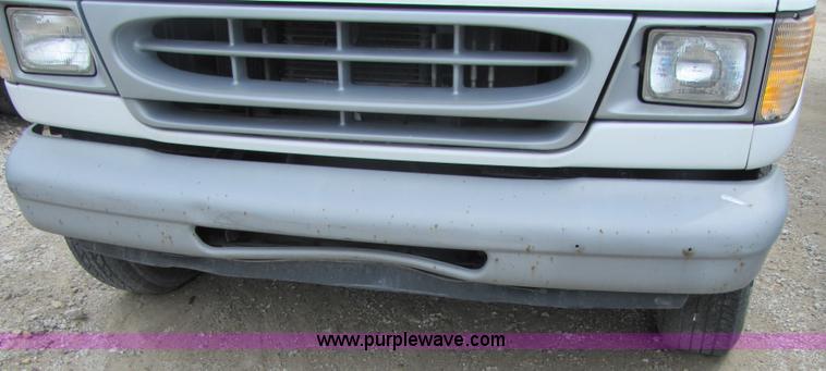 image for item 3136 1997 Ford utility van with shelving