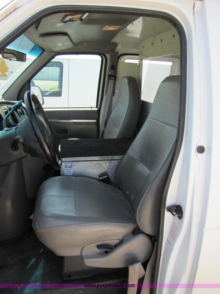image for item 3136 1997 Ford utility van with shelving