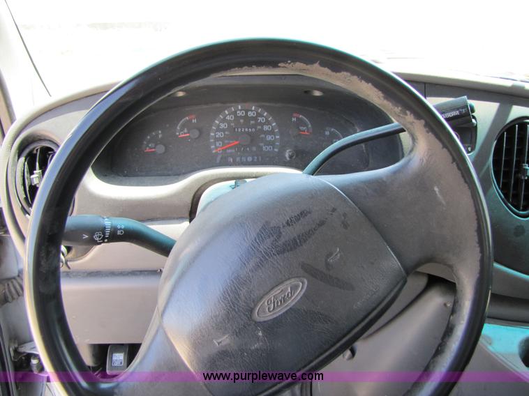 image for item 3136 1997 Ford utility van with shelving