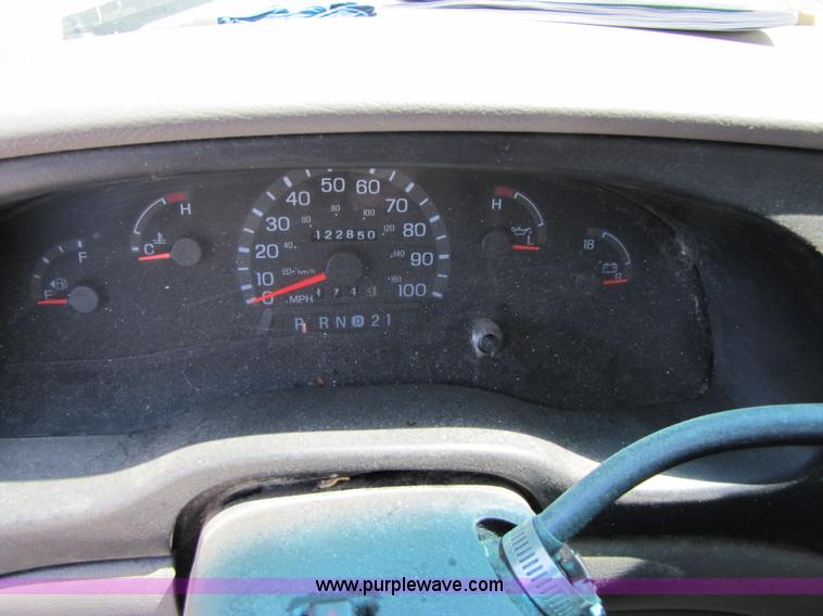 image for item 3136 1997 Ford utility van with shelving