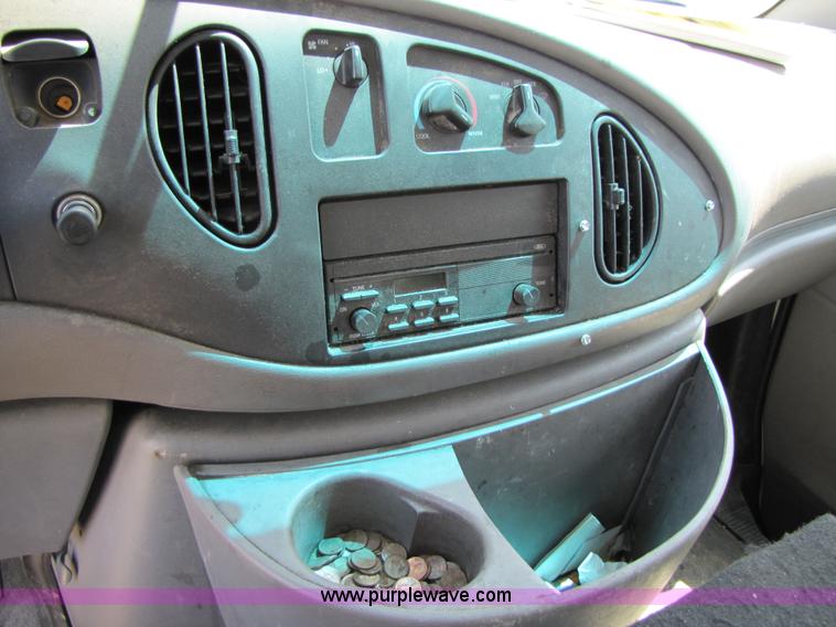 image for item 3136 1997 Ford utility van with shelving