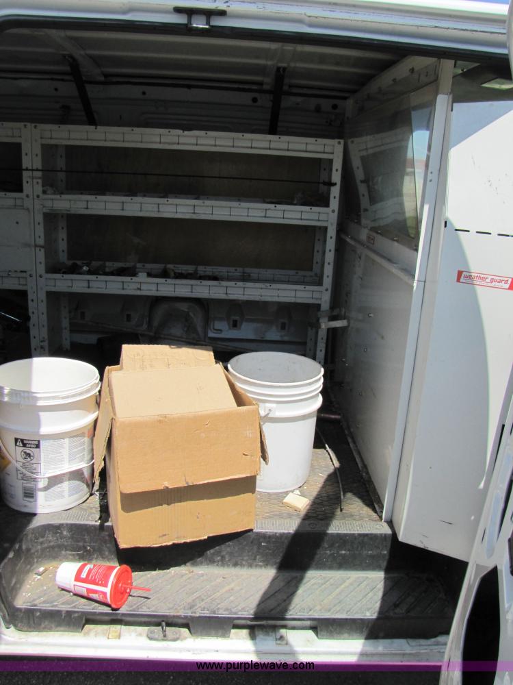 image for item 3136 1997 Ford utility van with shelving