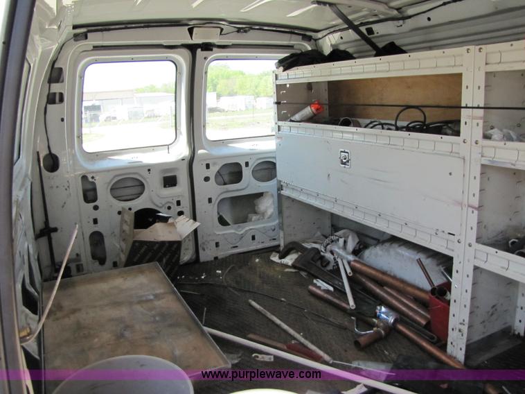 image for item 3136 1997 Ford utility van with shelving