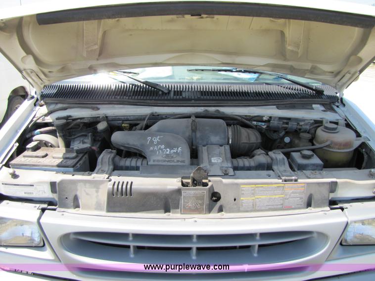 image for item 3136 1997 Ford utility van with shelving