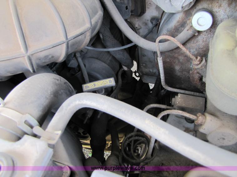 image for item 3136 1997 Ford utility van with shelving